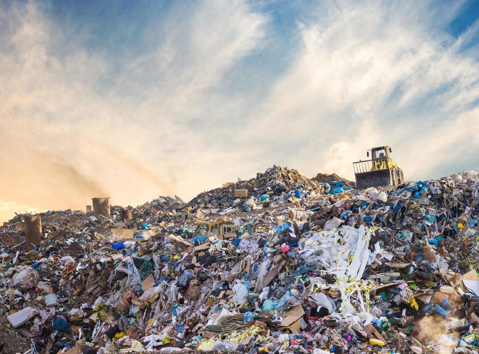 Textile waste and other debris disposed of in a landfill site